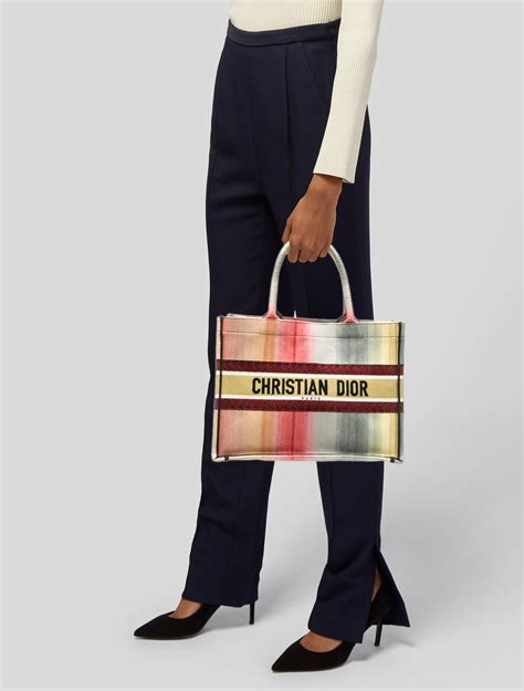 dioraura dior book tote|Dior designer tote bag.